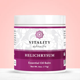 Vitality balm on bathroom vanity in lifestyle scene suggesting daily ritual use