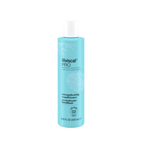 Viviscal conditioner pour closeup illustrating lightweight formula and detangling benefit