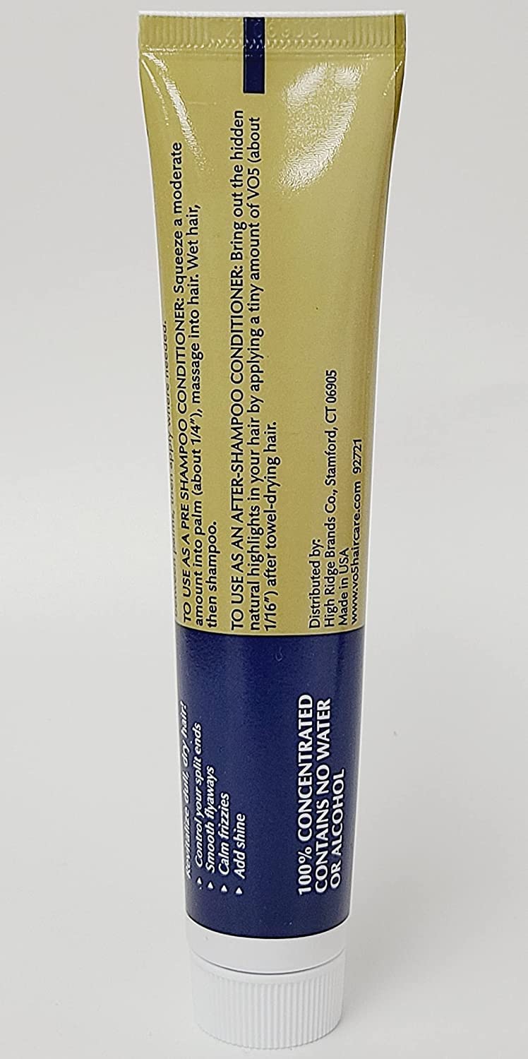 VO5 being applied to wet hair to detangle and reduce frizz for manageability