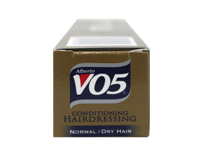 VO5 applied to hair ends in styling use demonstrating frizz control benefit