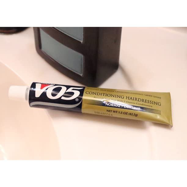 VO5 ingredient panel showing sunflower seed oil and vitamin E for nourishment