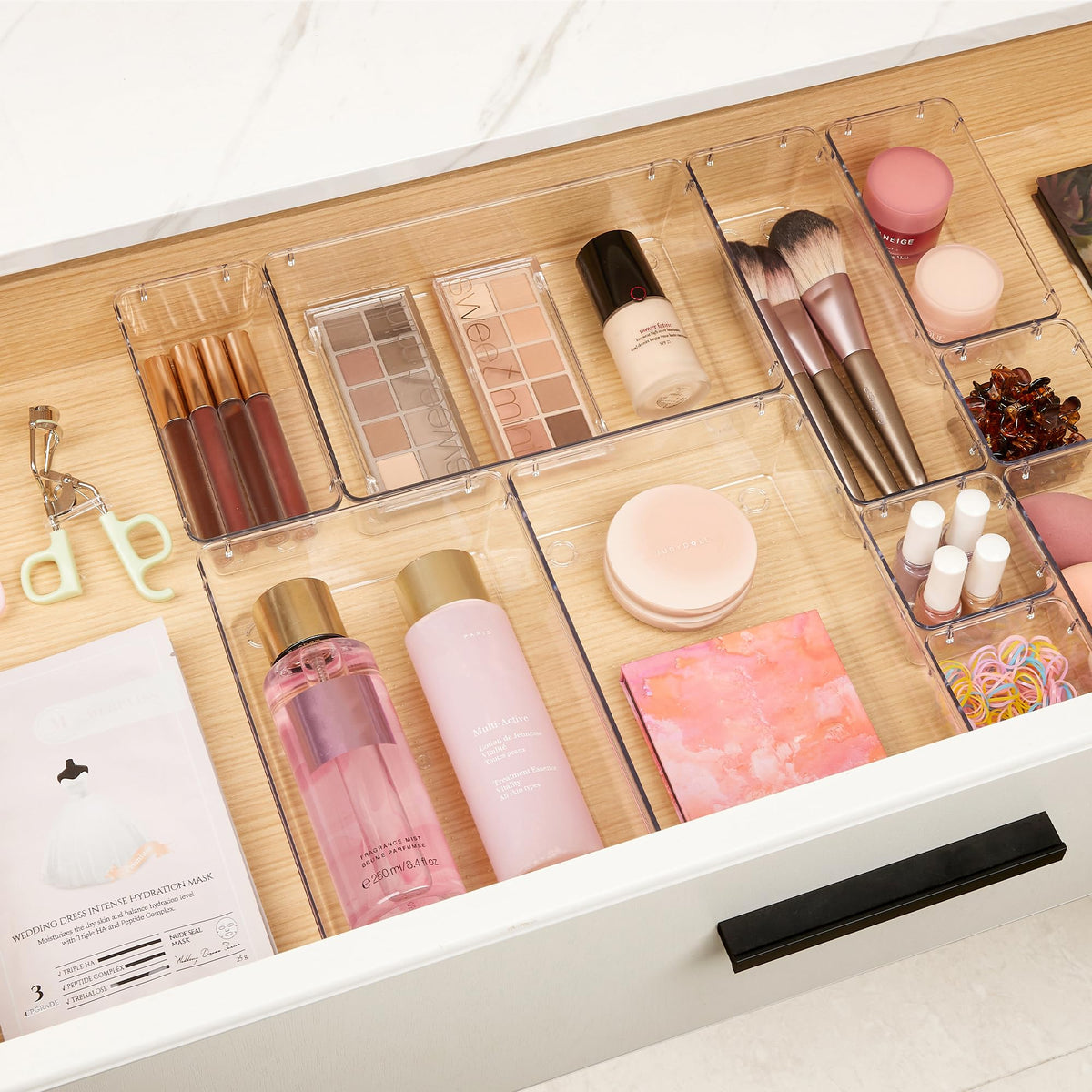 Vtopmart trays arranged inside a drawer demonstrating modular configuration and space savings