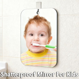 vxkzf mirror next to toothbrush showing 11x8 inch scale for practical sizing