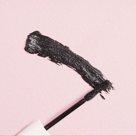 W7 mascara beside ruler to show compact, travel-friendly size