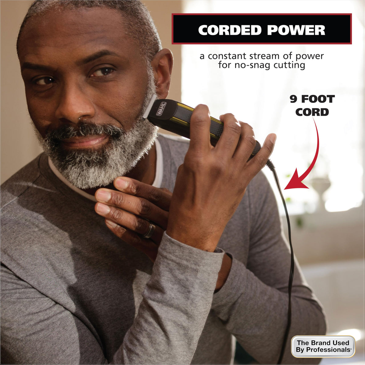 Wahl Edge Pro held in hand to show size and comfortable grip for controlled edging