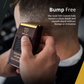 Wahl gold foil next to a coin for scale showing compact professional size