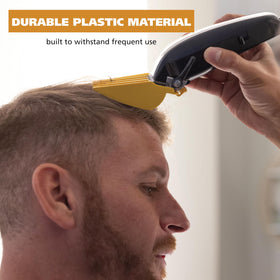 Wahl guards displayed in barber chair setting showing professional styling versatility