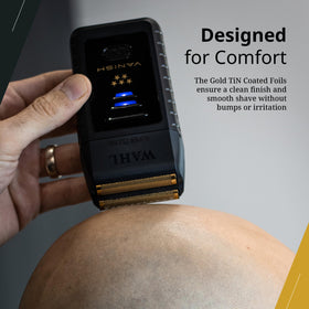 Wahl Vanish held in hand to show compact size and professional scale