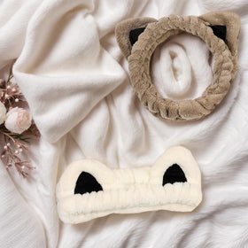 Waliah two headbands flat lay showing included pair for everyday and backup