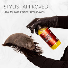 Walker Tape C-22 bottle placed beside human hair extensions to show compatible use