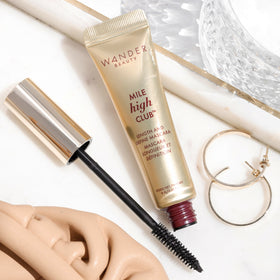 Wander Beauty mascara on bathroom counter suggesting everyday durable wear