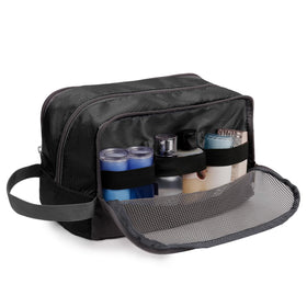 WANDF toiletry bag in travel packing scene demonstrating organized luggage