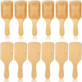 Wanmu bamboo paddle brush front view showing natural wood finish and wide coverage benefit