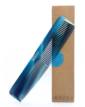 WAVEY front view blue comb showing compact travel-friendly shape