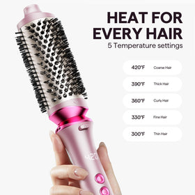 wavytalk brush held in hand to show compact scale and travel-friendly size
