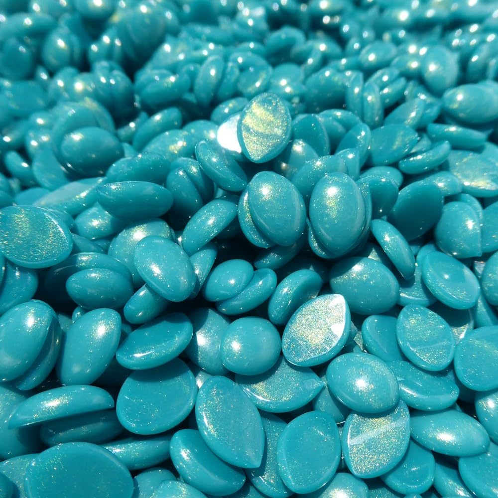 Tub of Waxness beside a hand for scale indicating generous 1 kg supply