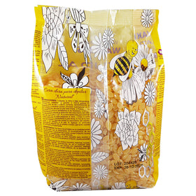 Waxness 1 kg container next to ruler, communicates size and salon-ready quantity