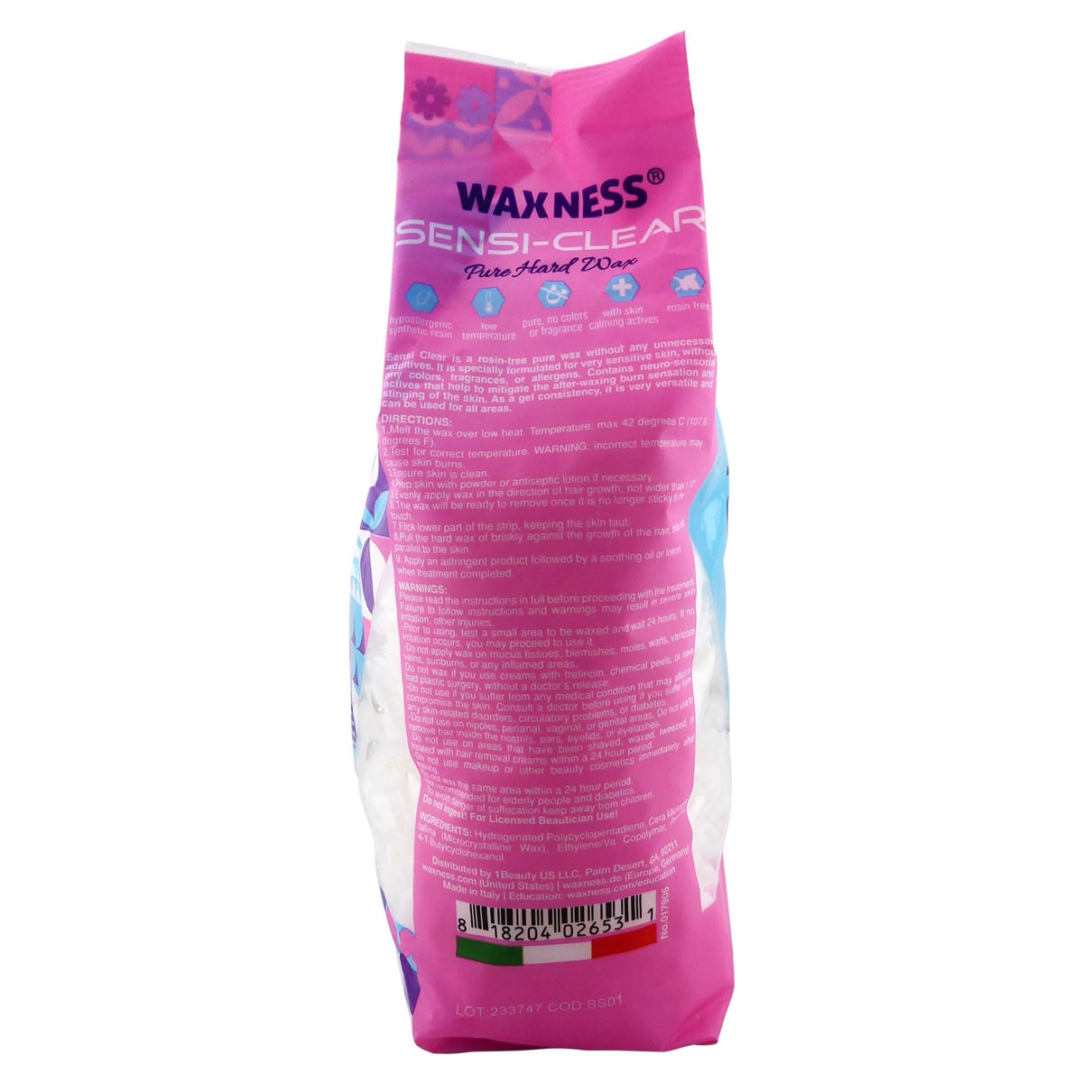 Melted Waxness wax spread thin on spatula showing precise application benefit