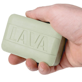 WD-40 Lava bar next to tools showing size and portability for jobsite convenience