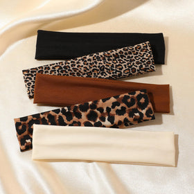 Weazppre headband worn while jogging shows secure hold during exercise