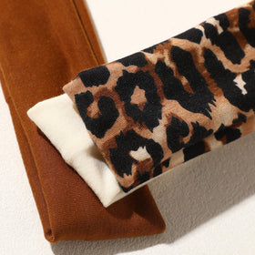 Weazppre hand holding headband shows size and portability for on-the-go convenience
