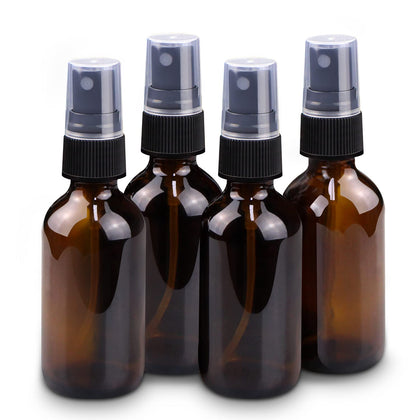 Wedama amber glass front packaging showing four compact bottles with sprayers, travel-ready
