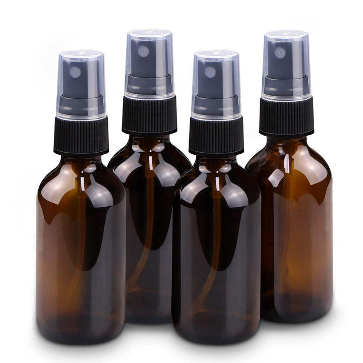 Wedama amber glass front packaging showing four compact bottles with sprayers, travel-ready