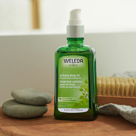 Close-up of Weleda Birch Cellulite Body Oil texture on skin showcasing fast absorption and smooth finish