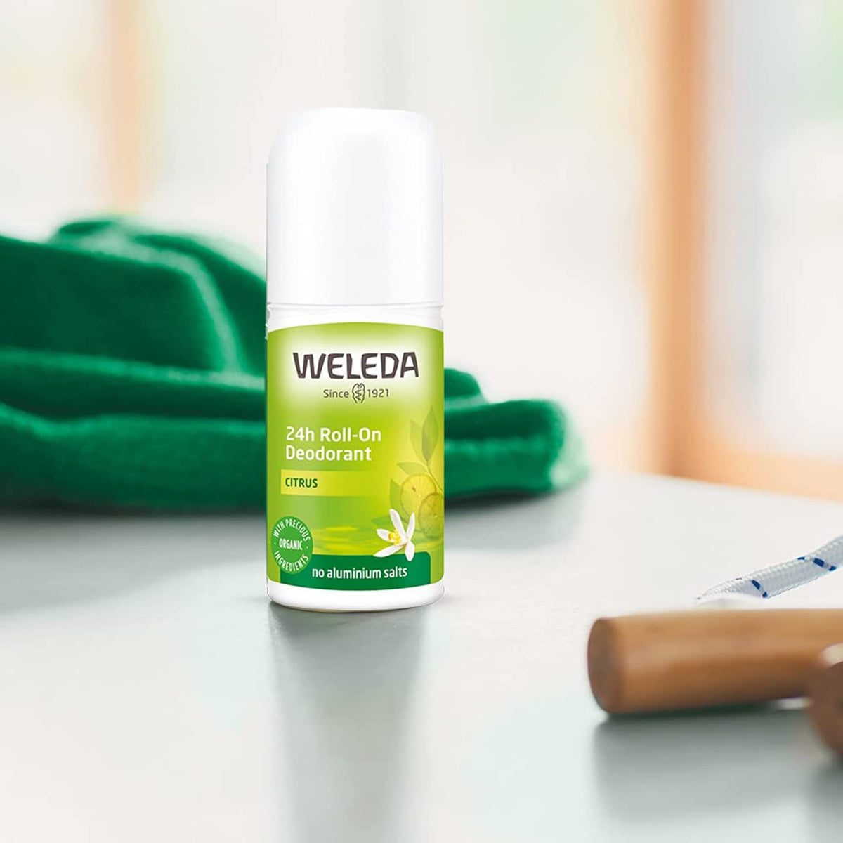 Weleda citrus roll-on ingredients label showing plant-based oils and essential extracts
