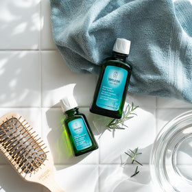 Weleda tonic being applied to scalp demonstrating targeted application benefit