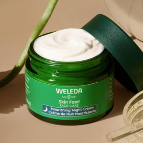 Weleda Skin Food Face open jar with lid showing product consistency benefit