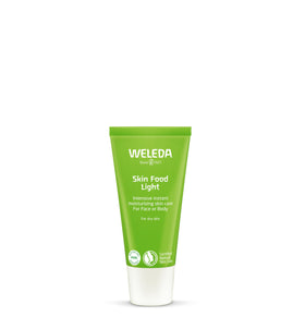 Weleda Skin Food Light front tube showing compact travel size and botanical branding benefits