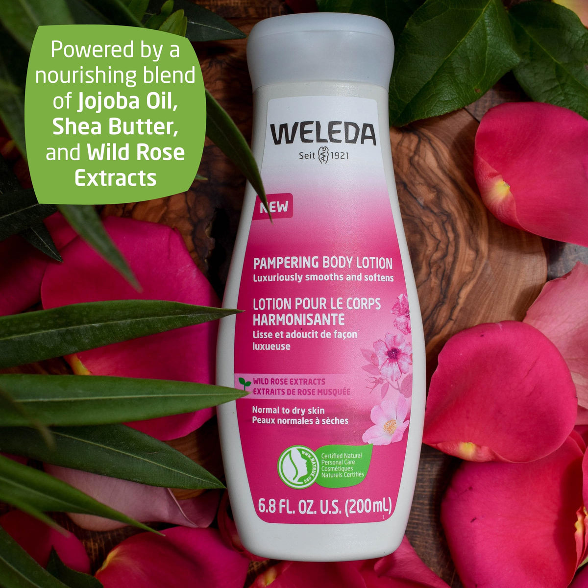 Weleda bottle in hand for scale showing compact travel-friendly size and convenience benefit