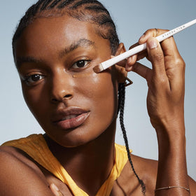 Well People concealer swatches on arm comparing coverage and undertone for easy shade selection