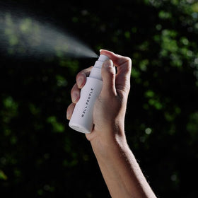 Well People fine mist spray close-up delivering even hydration and glow