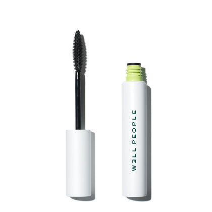 Well People Expressionist Pro Mascara front view showing sleek tube and brown shade benefit length