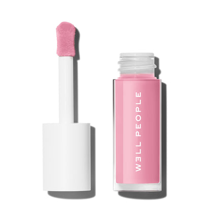 Well People lip tinted oil front packaging showing cherry blossom shade and glossy finish