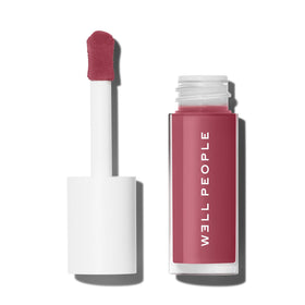 Well People front packaging of tinted lip oil showing Dusty Rose shade and benefits