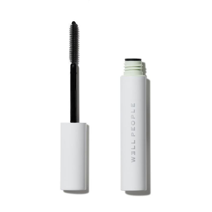 Well People mascara tube front showing sleek black packaging and product name benefit