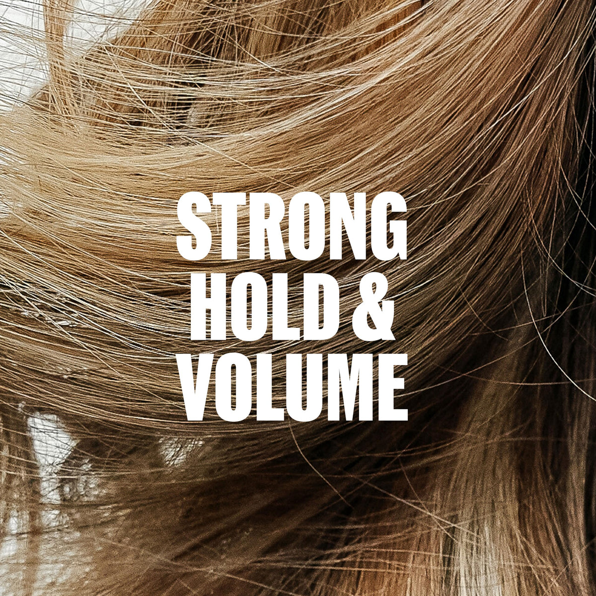 Wella Professionals being applied to damp hair for root lift and protection