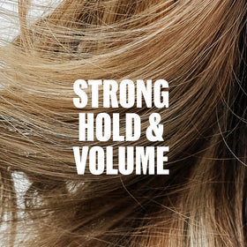 Wella Professionals being applied to damp hair for root lift and protection