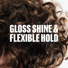 Wella Professionals product in hand applying gel to hair for easy styling control