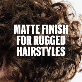 Wella Professionals EIMI Rugged Texture being warmed in hands for smooth application and even distribution