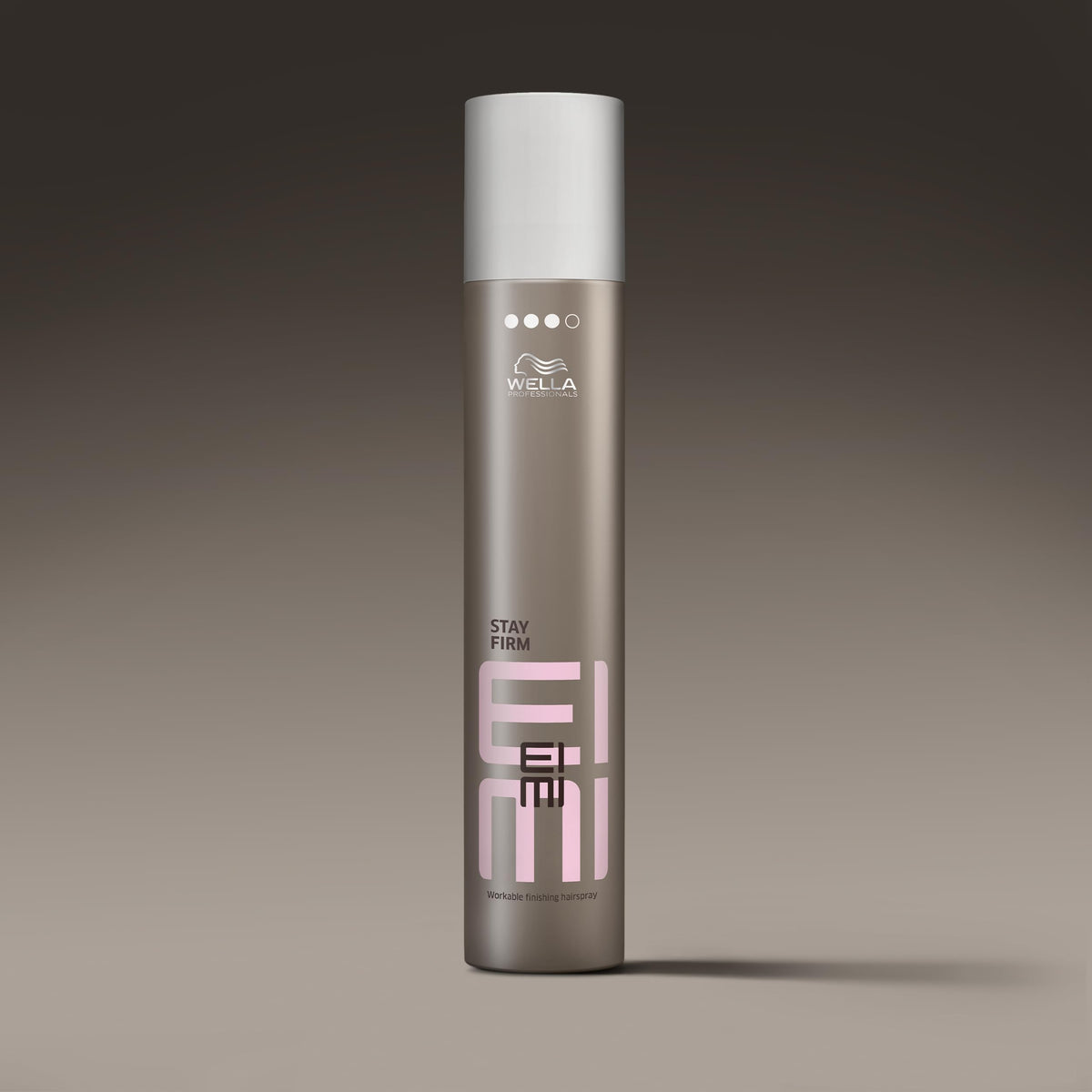 Wella Professionals EIMI Stay Firm next to ruler for scale showing 9 oz size benefit