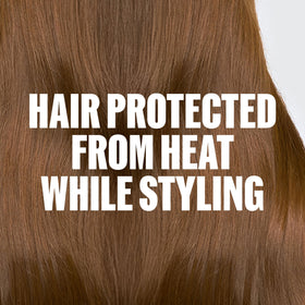 Wella Professionals spray nozzle in action misting hair, provides even application benefit