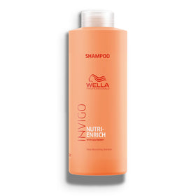 Wella Professionals front packaging showing 33.8 fl oz bottle and label benefit