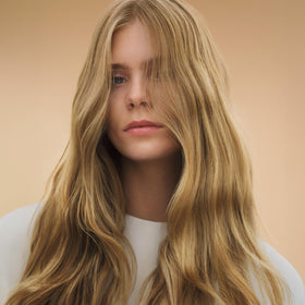 Wella Professionals before and after on lengths and ends showing smoother hair