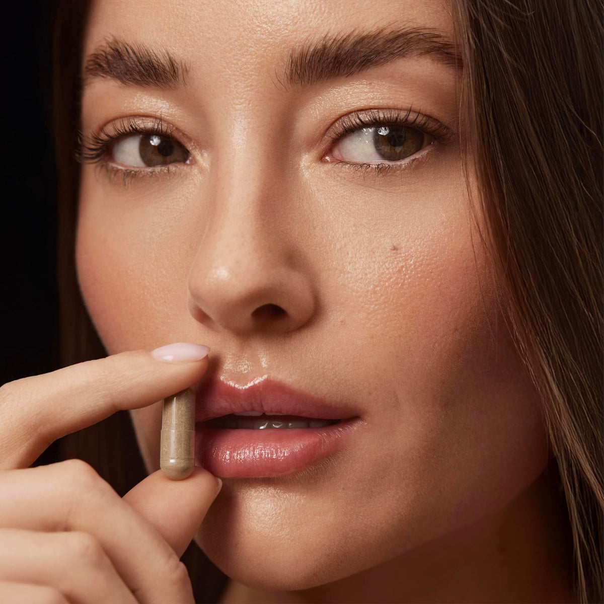 WELLBEL capsule texture and color detail emphasizing vegan purity