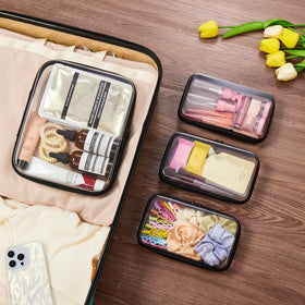WELPIRT stacked pouches inside a suitcase showing space-saving packing benefit