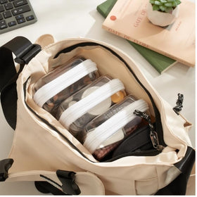 WELPIRT pouch next to smartphone to show 8x4x2 inch size and portability